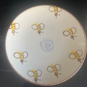 2 bee plates. New with tags. Never used. Kept in a glass cabinet